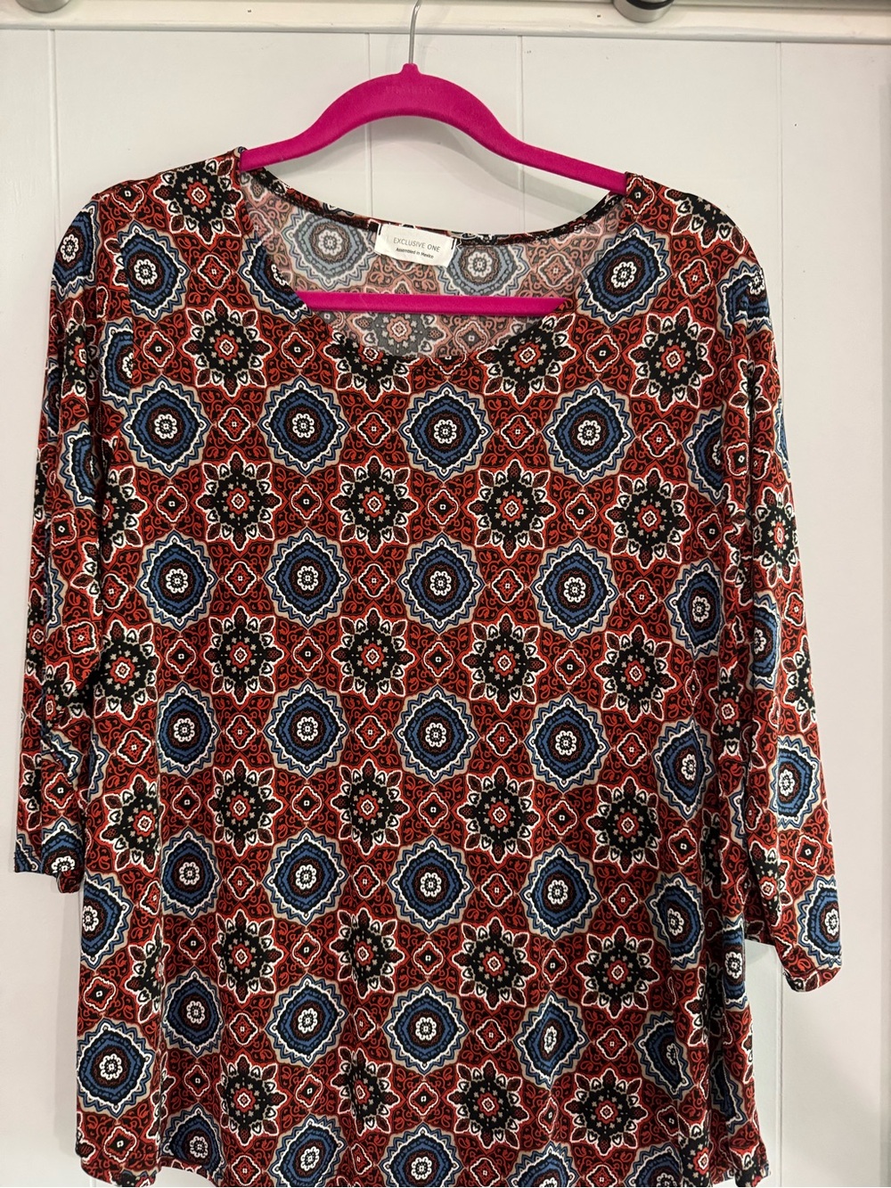 Elegant Geo-Print Women’s Top in Rust and Blue -